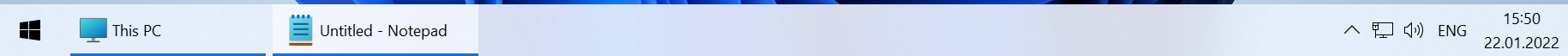 Windows 10-style taskbar with labels and a tidy tray running on Windows 11